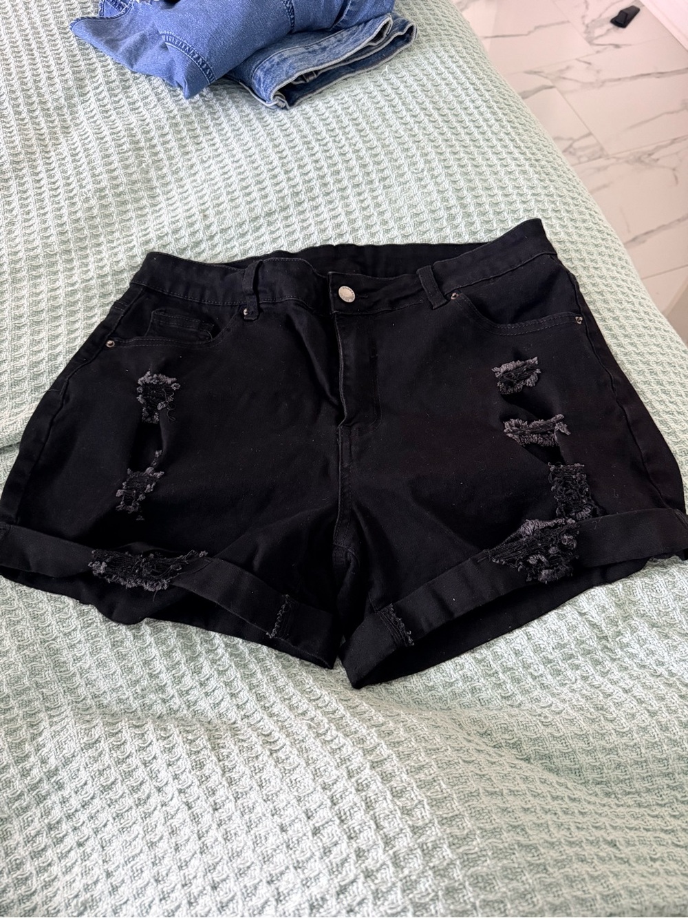 High-Rise Black Distressed Rolled-Hem Jean Shorts